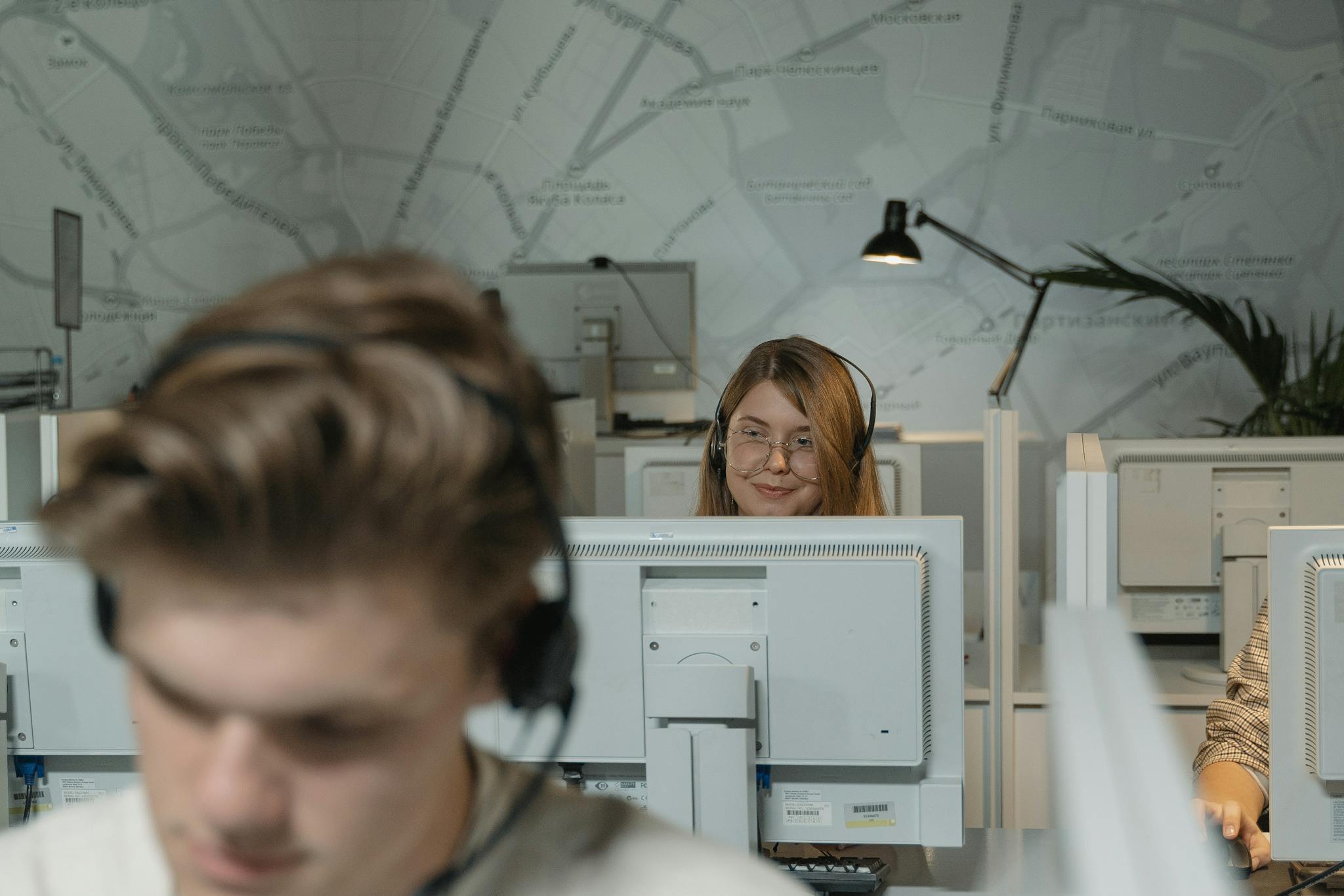 A Man and a Woman Working in Call Center